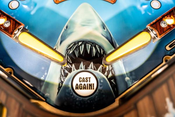 Sink your teeth into Stern's new JAWS pinball with real movie clips & gore