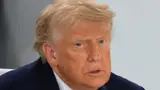 Donald Trump calls AI safety warnings ‘a hoax’ during live call with Jensen Huang